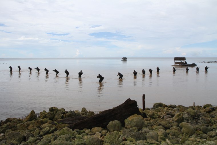 Philippine Marine Commandos train for a beach landing.